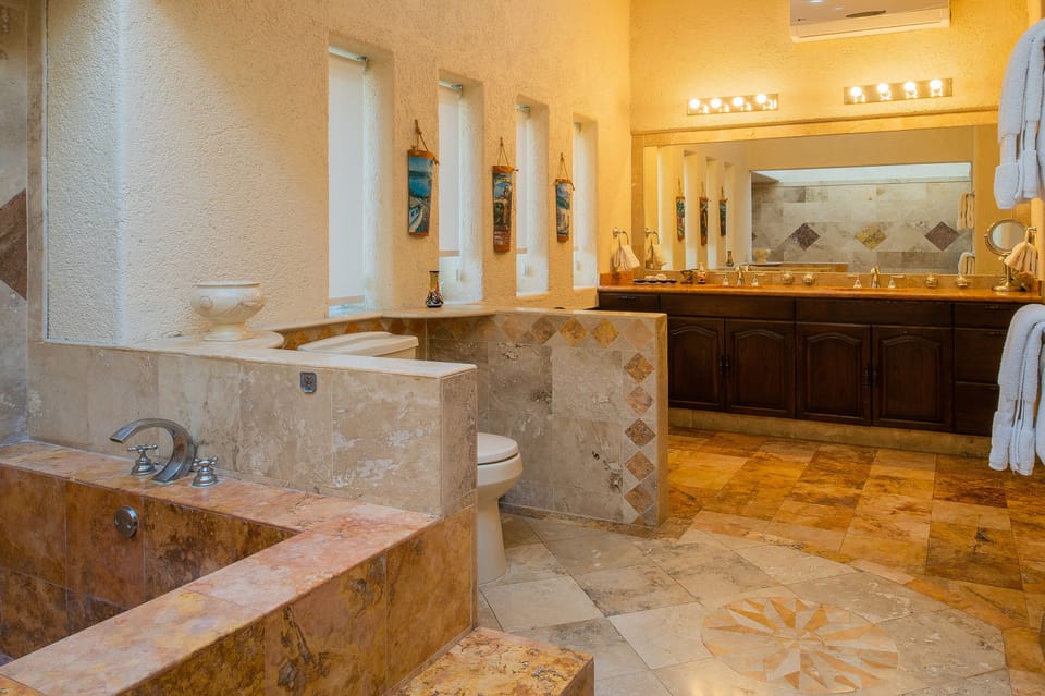 En suite bathroom with bath tub