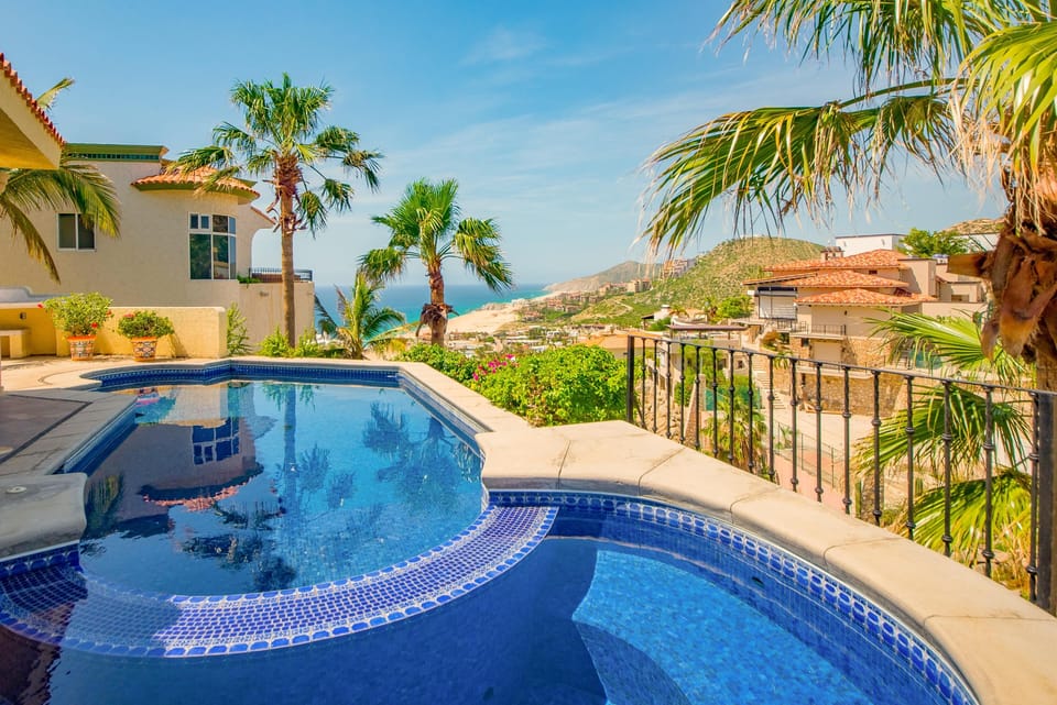 Patio with lounge chairs and pool