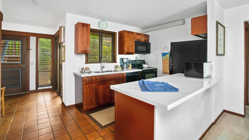 Nihi Kai Villas at Poipu #823 - Kitchen & Entry - Parrish Kauai