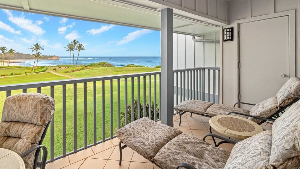 Poipu Sands at Poipu Kai Resort #523 - Shipwrecks Beach Covered Lounging Lanai View - Parrish Kauai