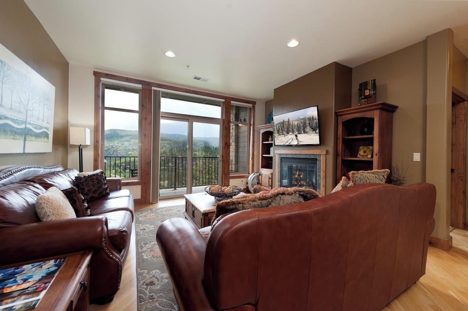 Main Living Space - Gas Fireplace, TV and Deck with awesome views