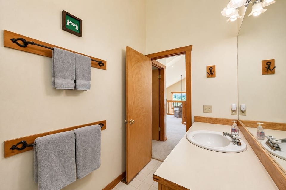 Full bathroom with bathtub on upper level of the home.