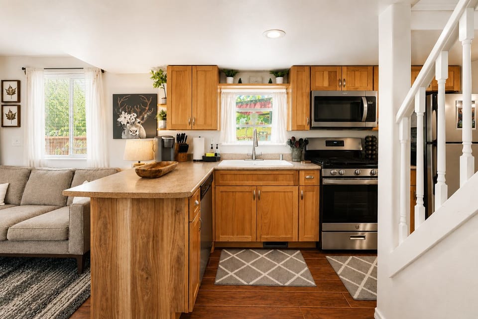 Kitchen is fully equipped with all necessities including a dishwasher.