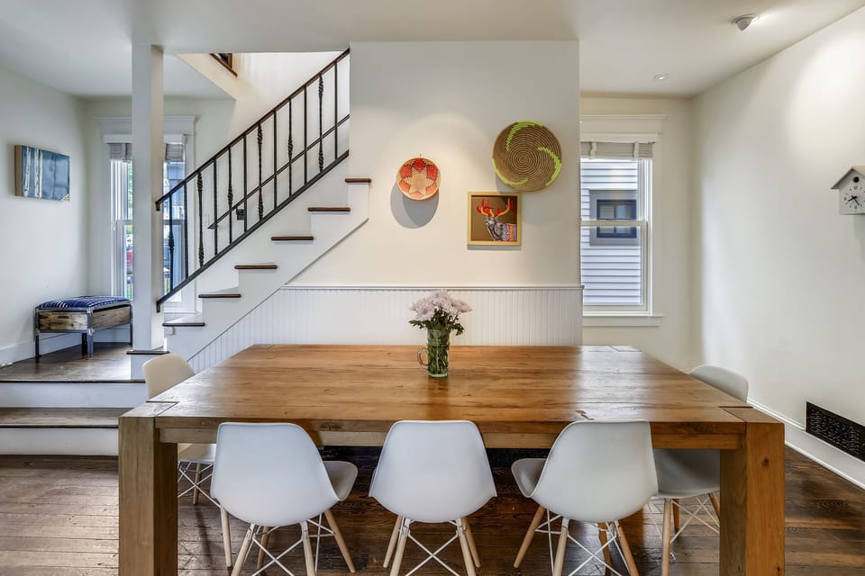 Beautiful dining table seats 8. There's a bench on the other side.