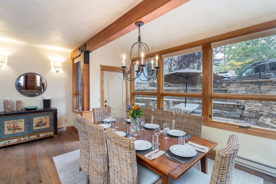 Dining room area with view of private terrace. Seating for 8 guests.  Adjoins kitchen and living room.