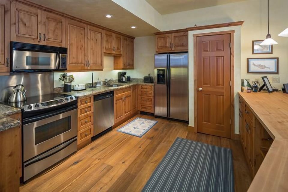 Kitchen - Kitchen with new butcher block counter and all new kitchen ware.