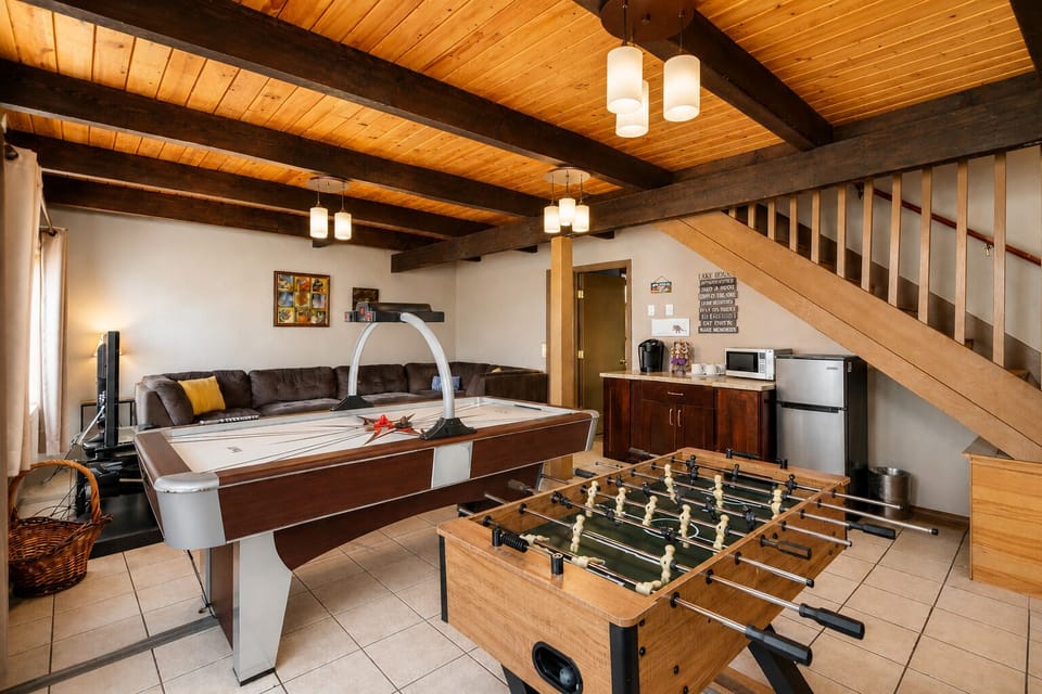 Lower Level Game Room Space with Table Games and TV with Streaming