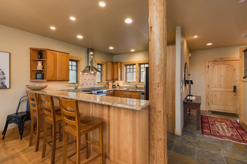 Fully Stocked Kitchen with Breakfast Bar