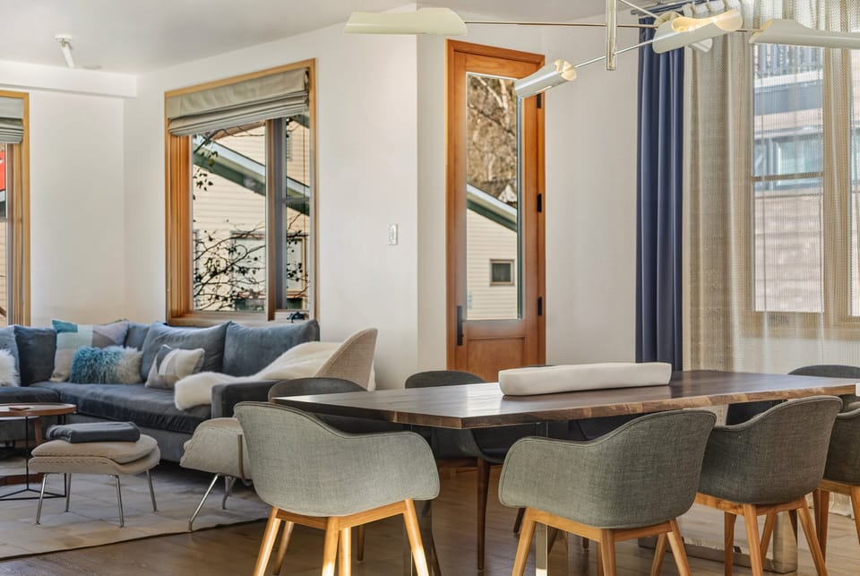 A thoughtful open layout allows the living area to integrate with the dining and kitchen spaces, perfect for family interaction