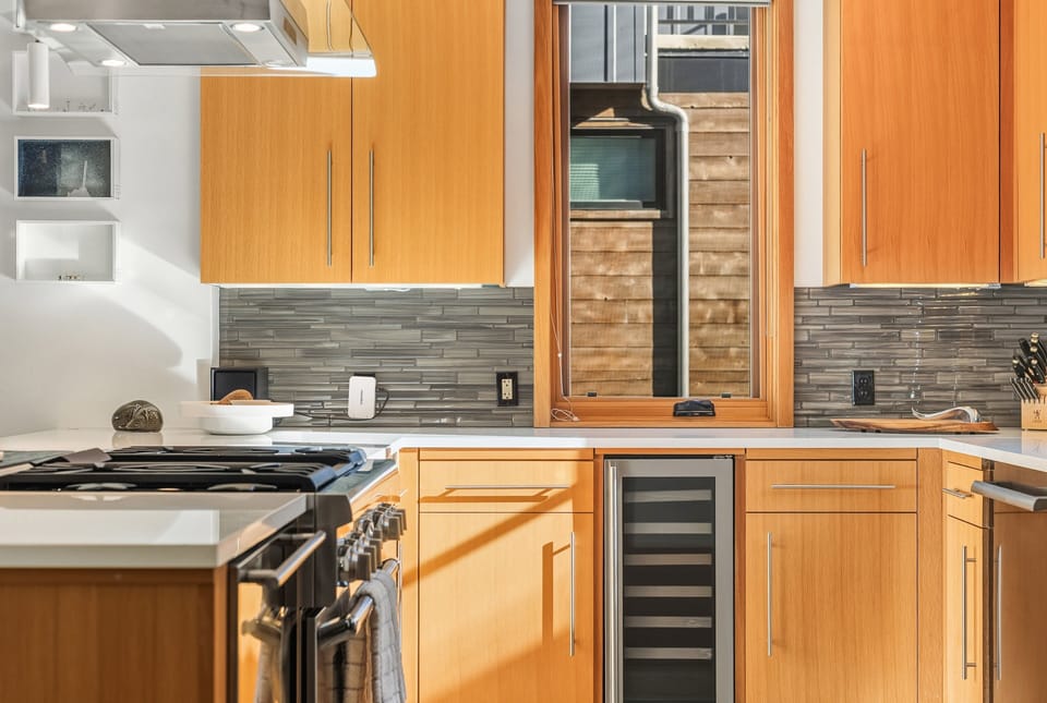 Luxury meets functionality in this gourmet kitchen, complete with modern appliances and everything required for culinary creations, all with spectacular views.