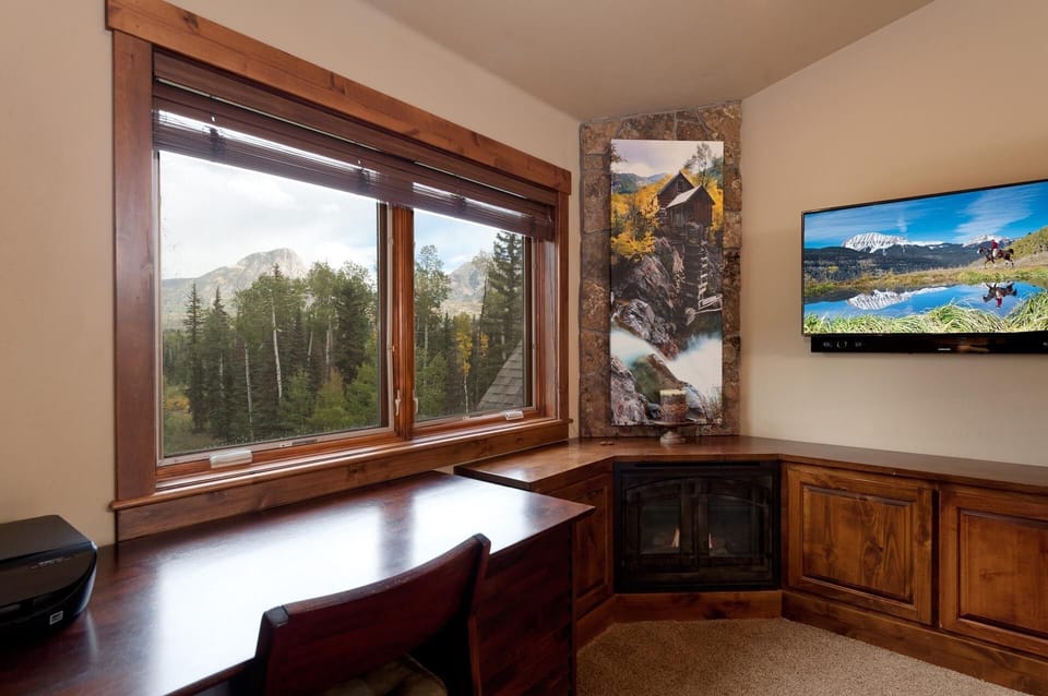 Master bedroom with king bed, TV and ensuite bath. Located on the 2nd floor.