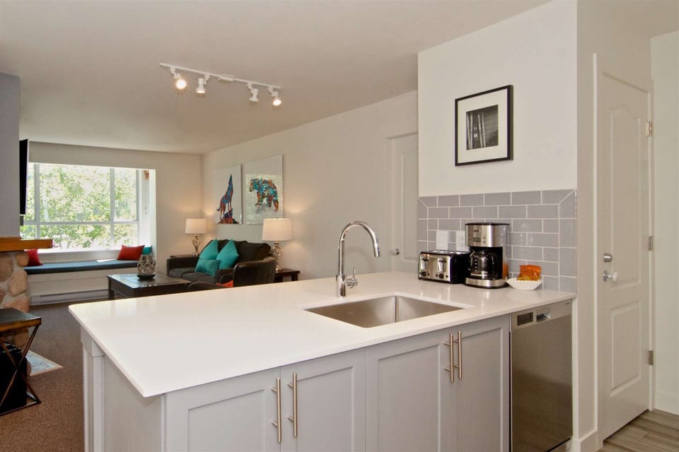 Newly installed kitchen island and appliances, filter coffee maker & toaster