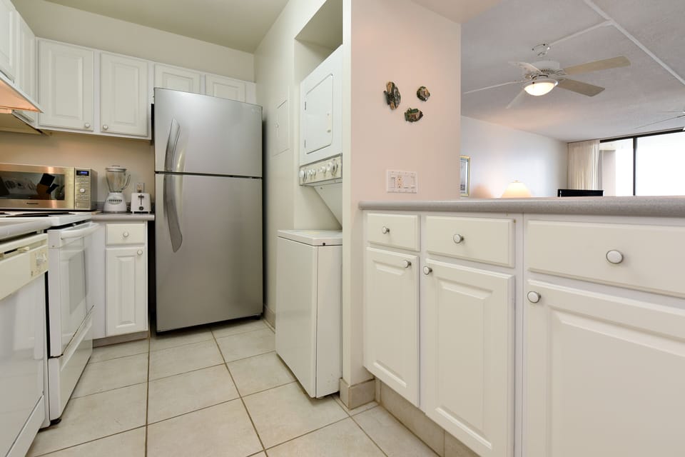 Full kitchen and laundry area.