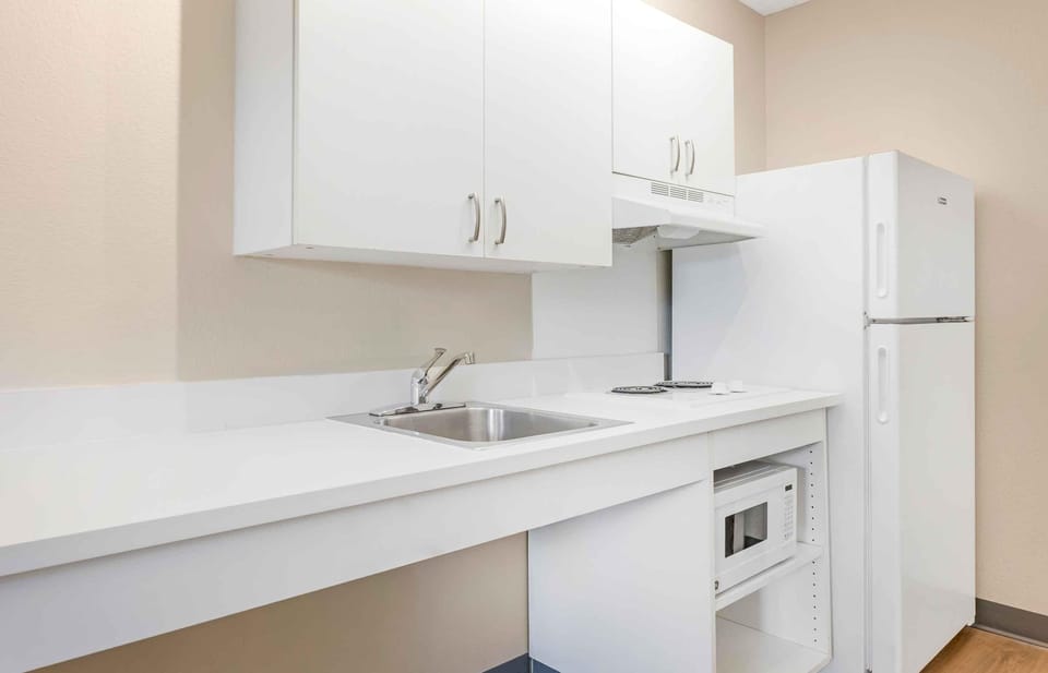 Studio, 1 Queen Bed, Accessible, Non Smoking | Private kitchen | Fridge, microwave, stovetop, coffee/tea maker