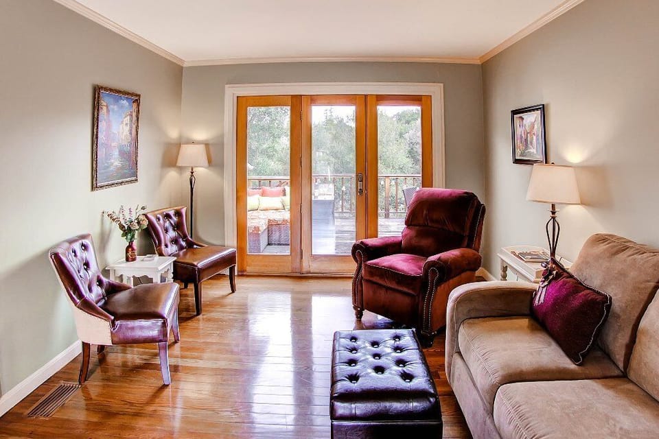 Living Room - Comfy Decor for your Group. Living Area with Access to the Rear Deck