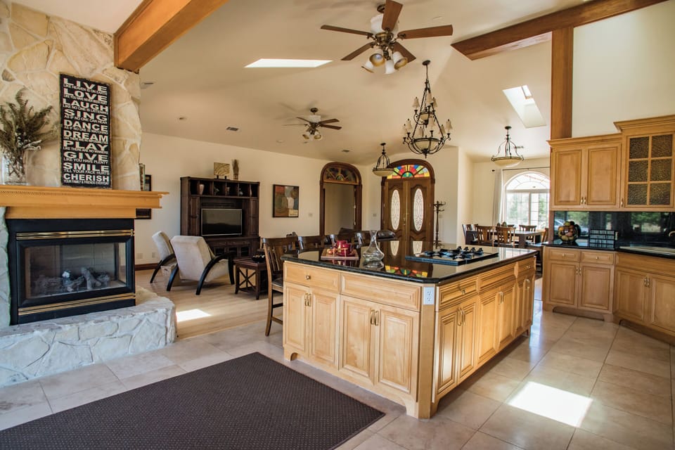 Gourmet kitchen overlooking the main living area.