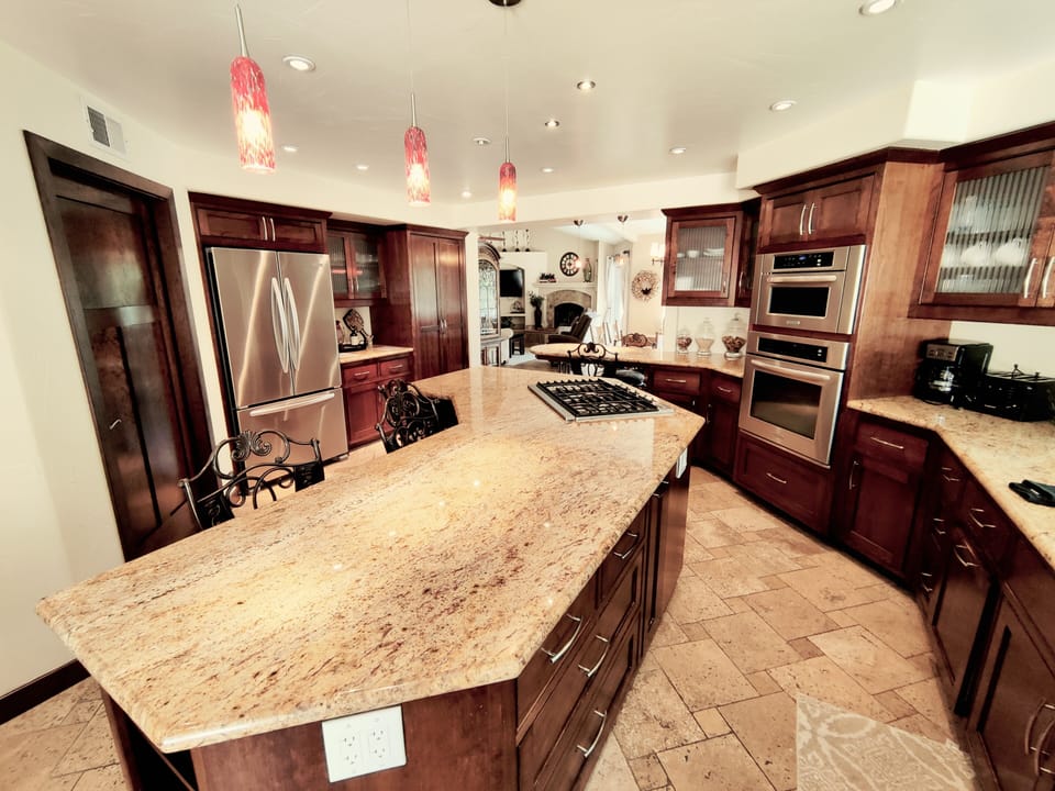 Huge Granite Countertops and Island with Built in Range