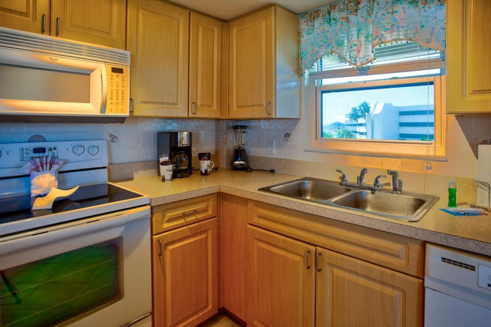 Equipped with small and large appliances and a complimentary starter kit of coffee, soaps, paper towels and more.