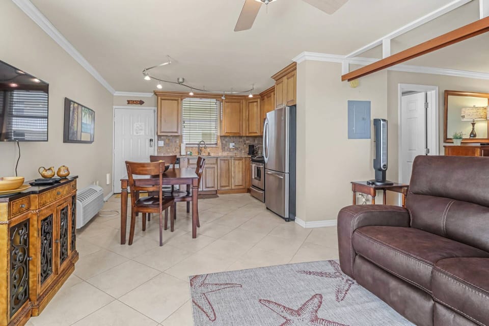 The living, dining and kitchen spaces flow effortlessly together.