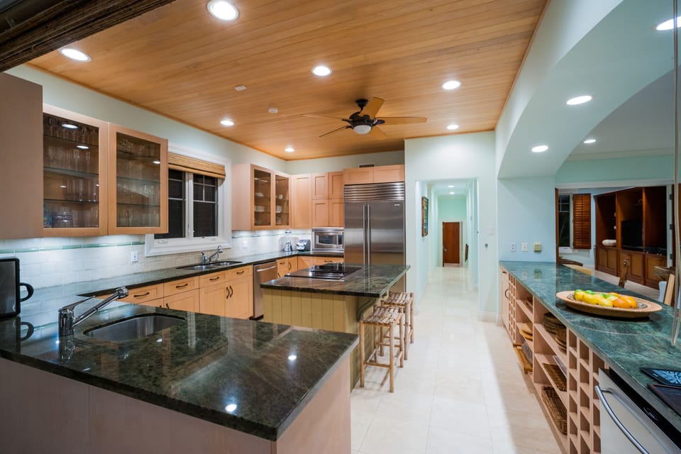 Explore the modern kitchen and appliances that has plenty of room multiple cooks.