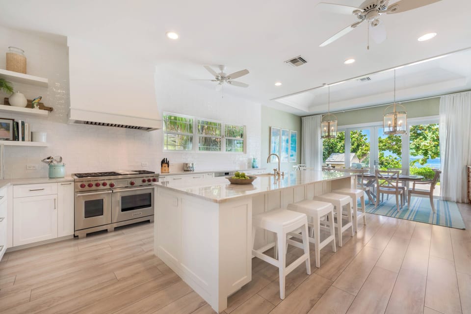 Gourmet kitchen with a full suite of appliances. 