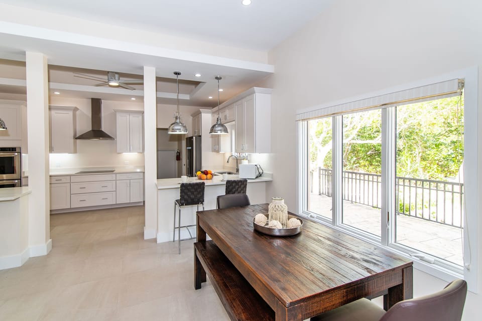 Overflow dining table with bench seating.