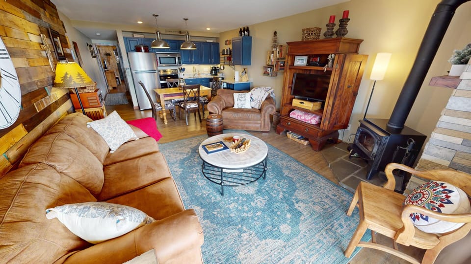 Living Area with Flatscreen, Wood Fireplace - Living Area with Flatscreen, Wood Fireplace