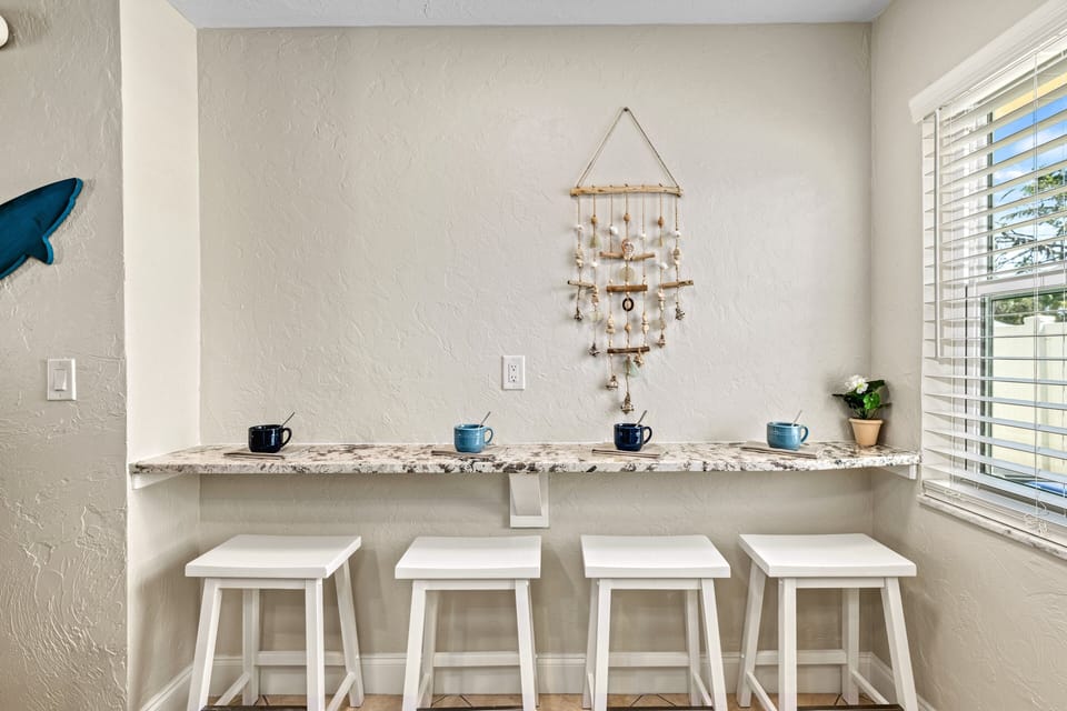 Pull up a stool and enjoy good eats and even better conversation, just steps from the action.