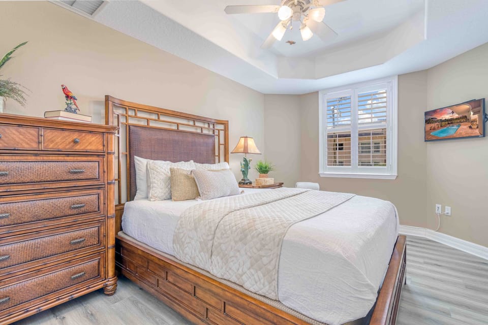 Bedroom 2, where comfort meets style in this serene second queen suite, complete with HDTV and soft linens.