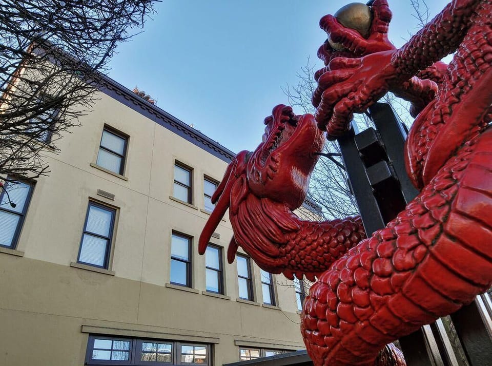 Landmark architecture! View of the famous red dragon sculpture gate located steps away in Victoria's Chinatown.