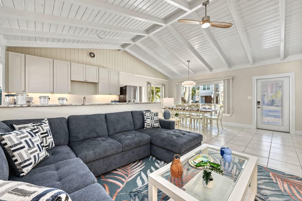 From your cozy corner in the living room, take in the seamless flow to the dining area and kitchen.