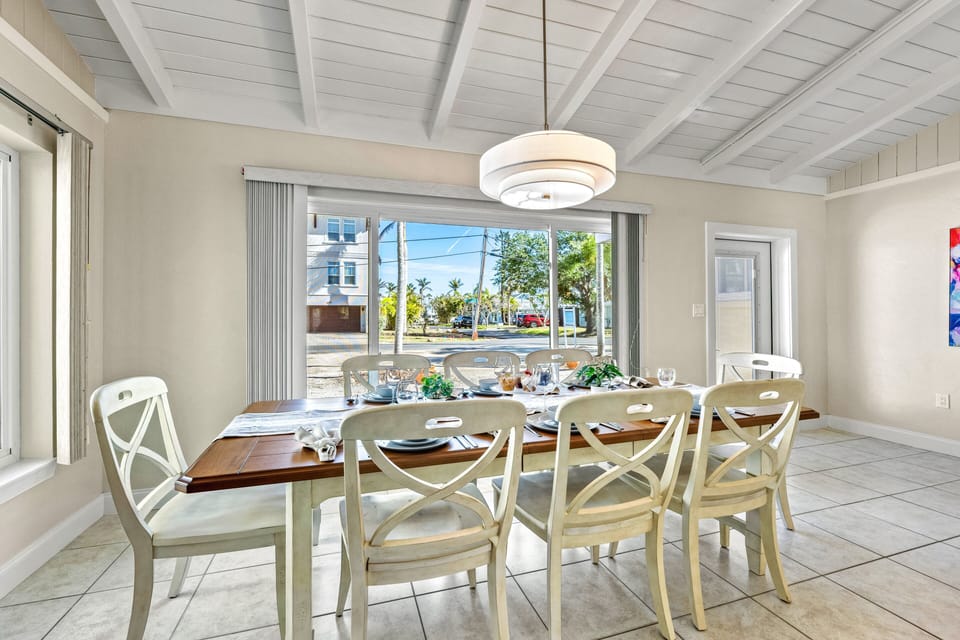 Perfect for family-style feasts or casual takeout from the Village, this table sets the scene for shared stories and laughter.