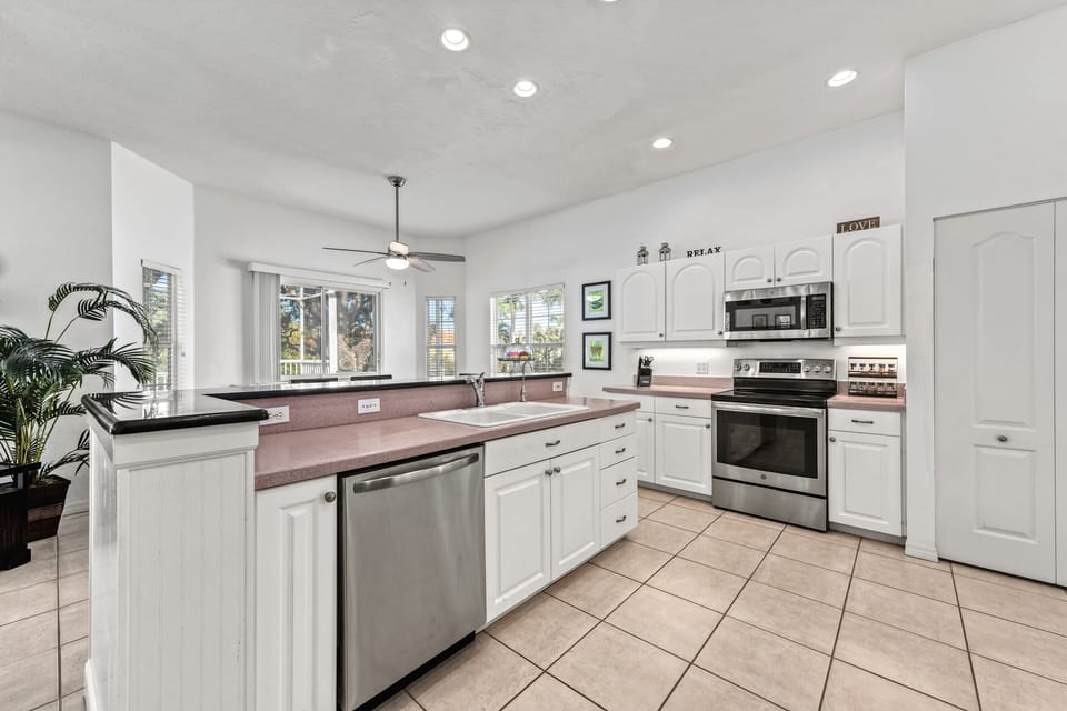 From morning coffee to gourmet meals, this sleek kitchen makes every culinary moment feel special.