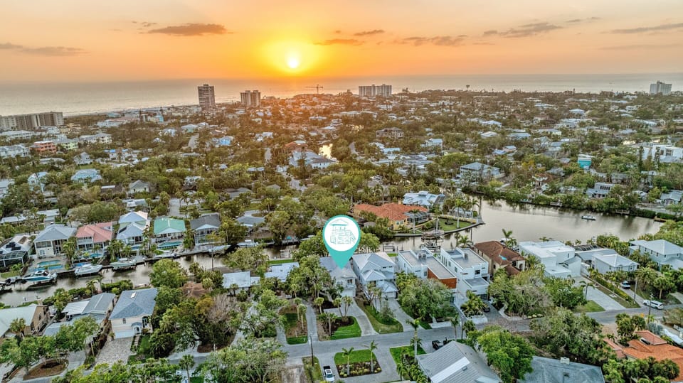 Golden skies melt into Gulf waters at the most unforgettable beach just 0.4 miles down the street.
