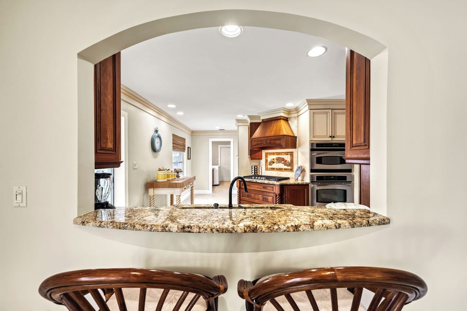 Kitchen pass-through for quick breakfasts or extra prep space for group meals.