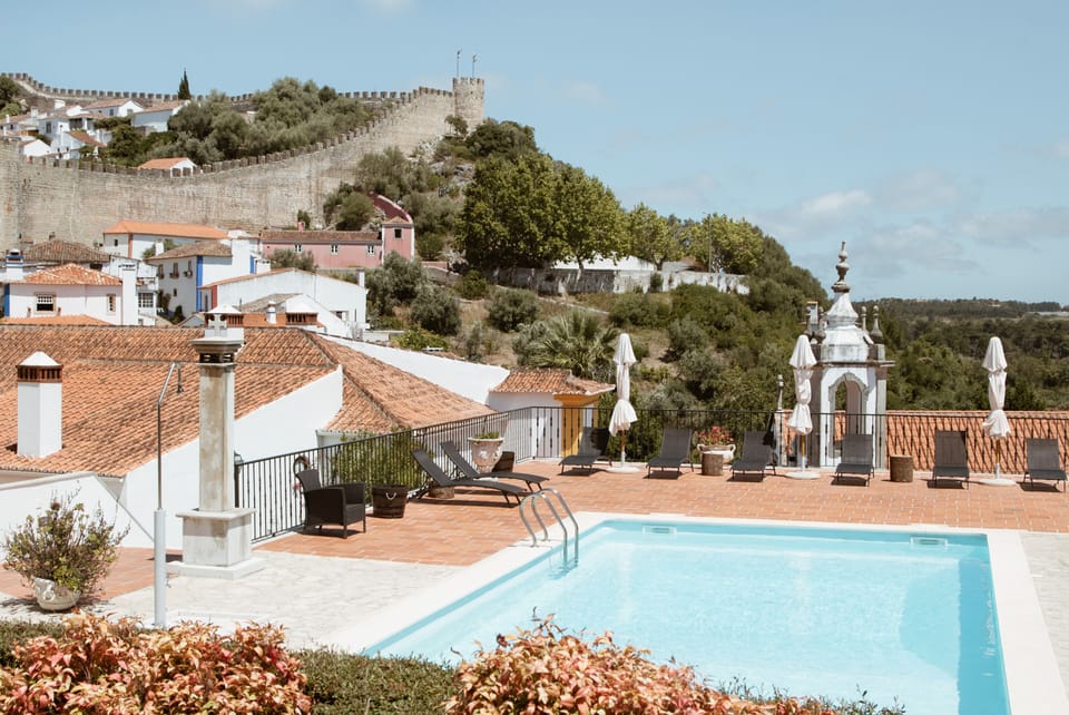 Seasonal outdoor pool, open 10 AM to 8 PM, pool umbrellas, sun loungers