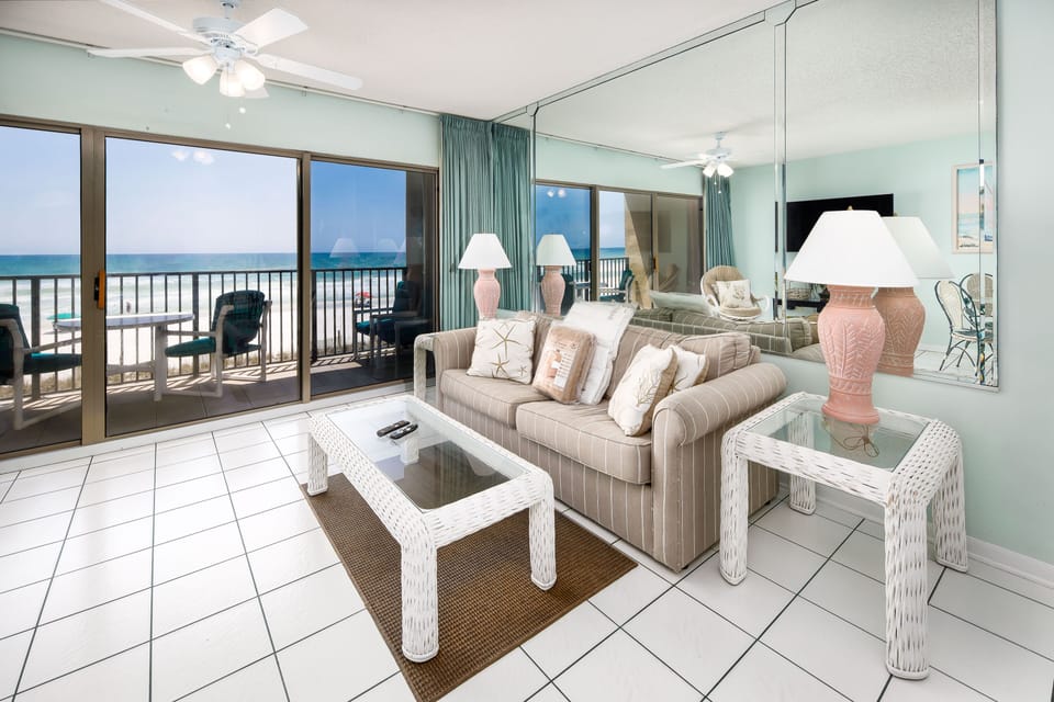 Living Room - Just steps away from your private balcony!