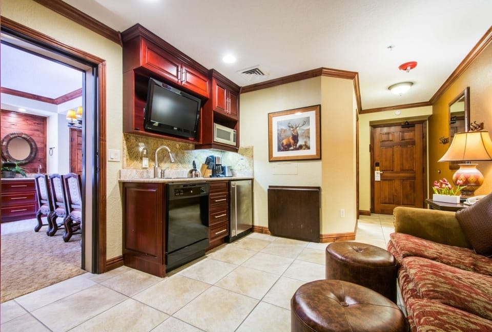 Living suite (2) with gourmet kitchenette, comfortable living area with HDTV and large bedroom suite.