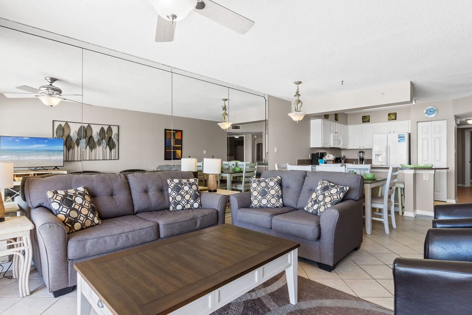 Living Room - Snuggle up for a movie or watch the majestic waves crash on the beach.