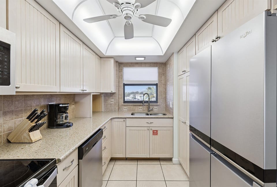Fully equipped kitchen with modern appliances and ample counter space.