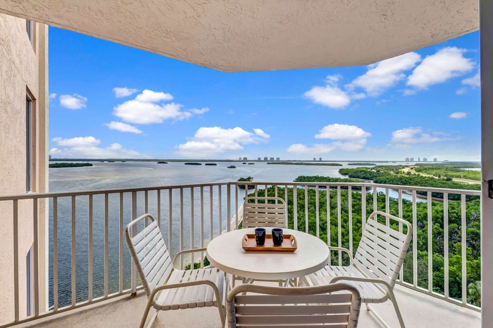 Outdoor balcony with an eastern view of the Estero Bay as far as the eye can see, with Bonita Springs and Naples in the distance.