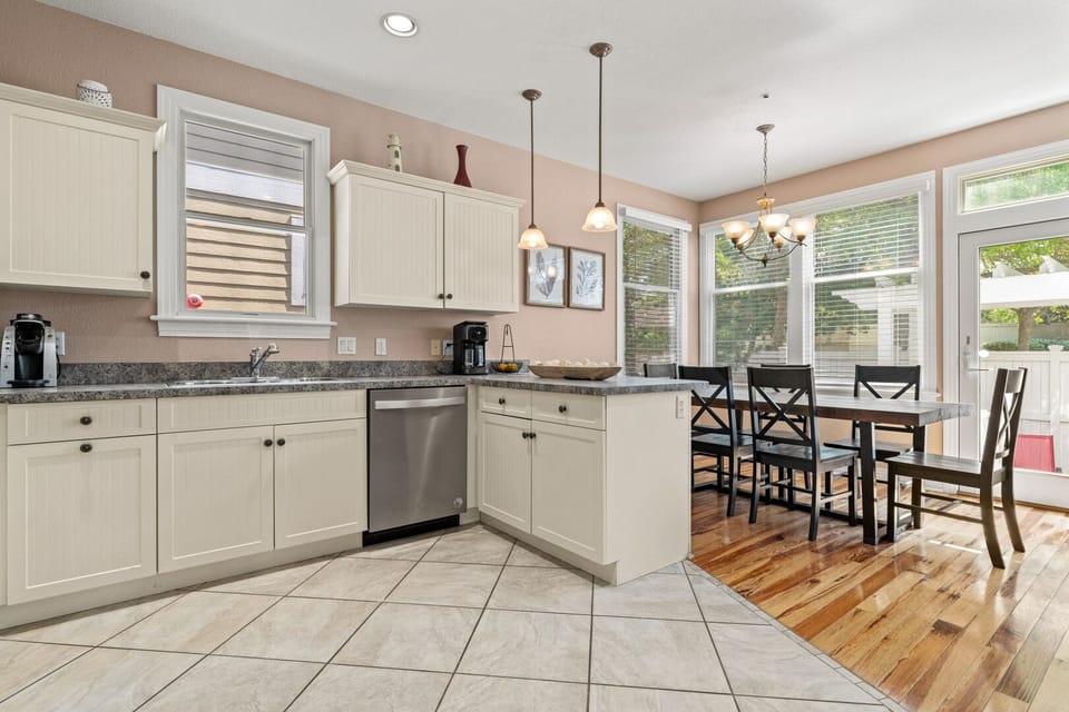 Kitchen with Bar Seating on First Level