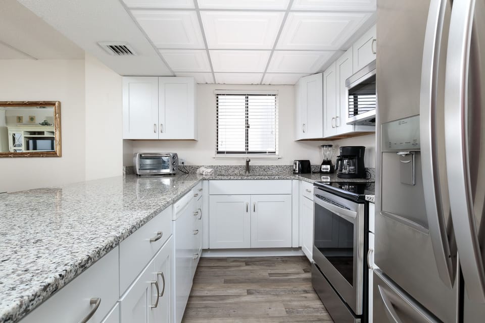 Kitchen - This unit features stainless steel appliances & lots of cabinet and counter space