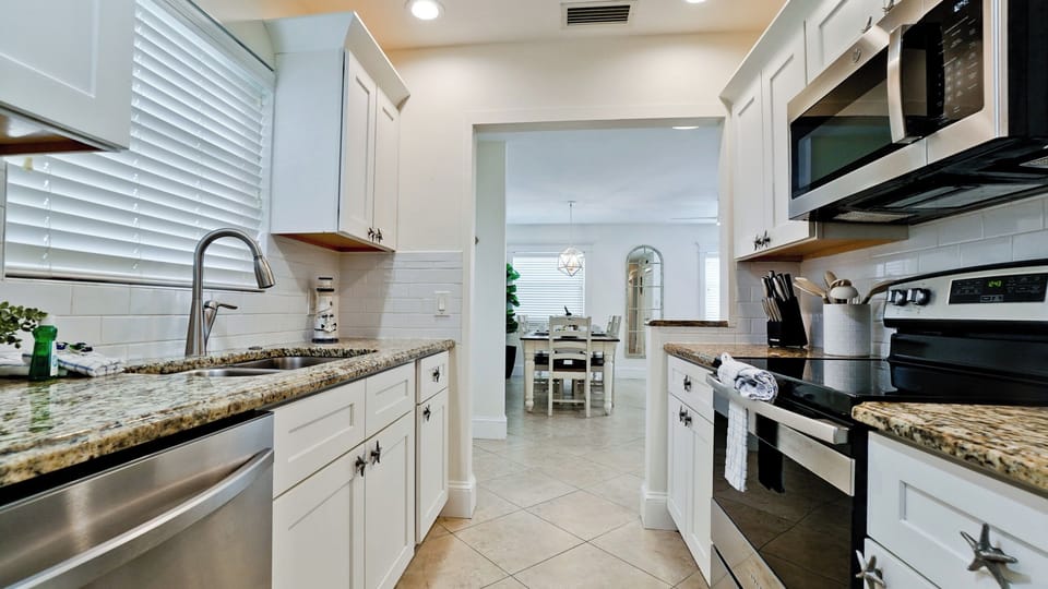 Galley style kitchen with dishwasher