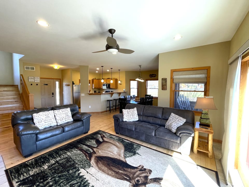 Living Room with Cozy Seating, Queen Sofa Sleeper, TV & Fireplace