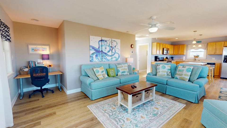 Living room and desk - Living room and desk at Summer Paws vacation rental, Carova Beach 4x4 Northern Outer Banks NC