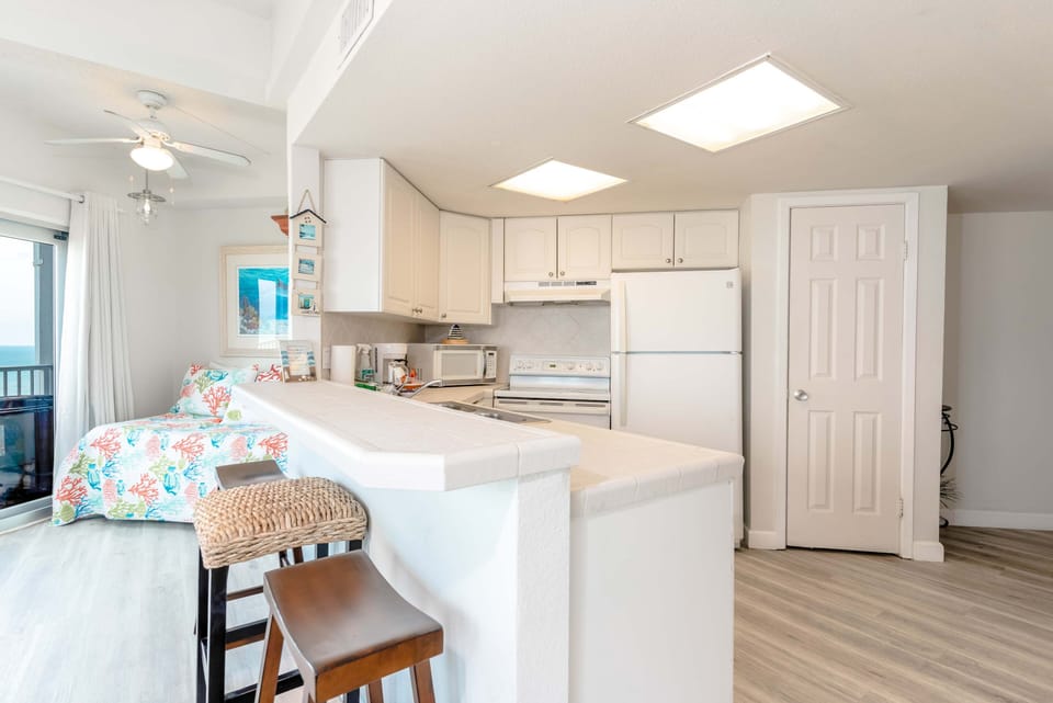 Our kitchen feels like a grand space with its panoramic view of the beach.