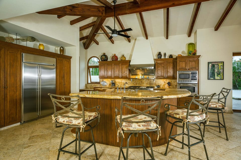 Whip up a culinary masterpiece with the professional appliances found in Casa Maravilla's spacious gourmet kitchen!