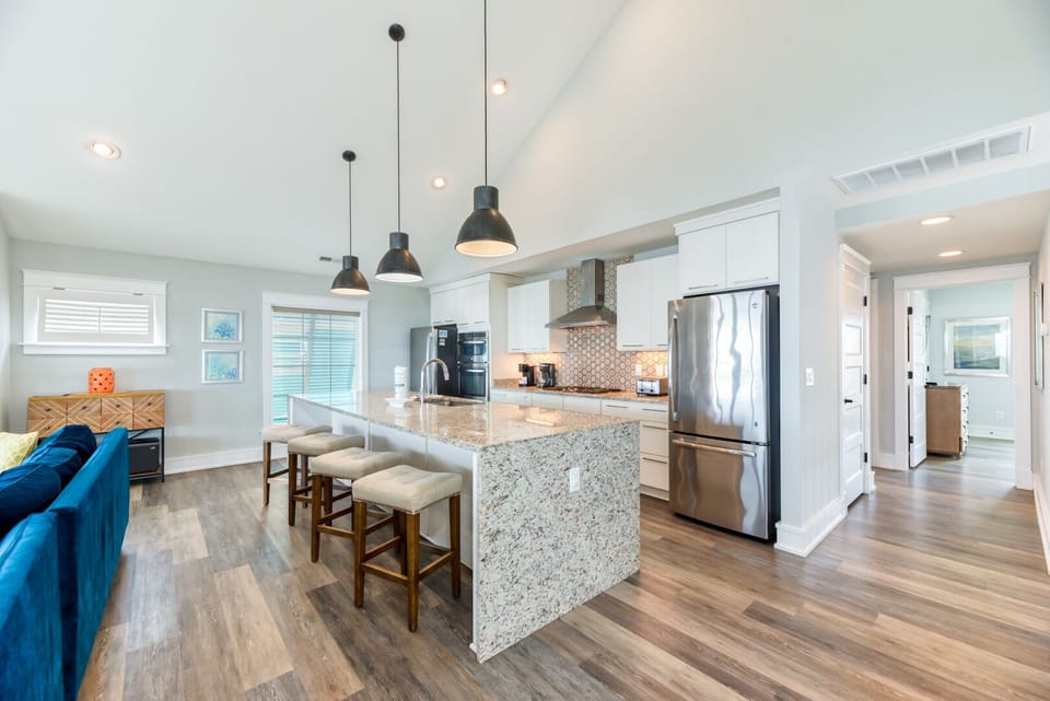 Kitchen with Bar Seating on Third Level