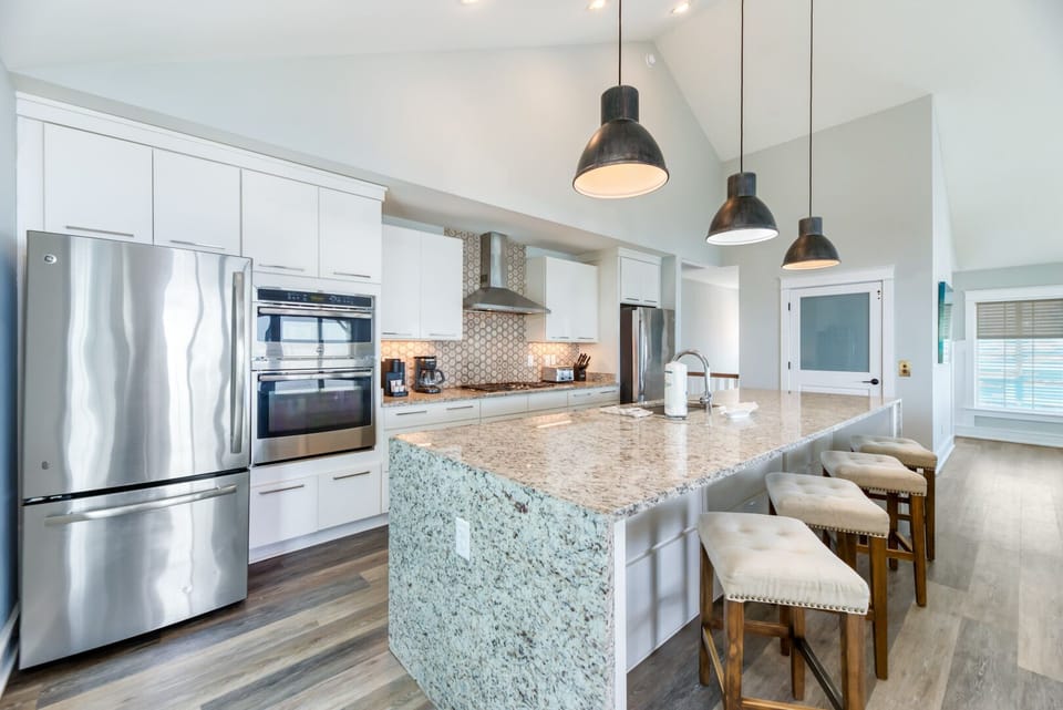 Kitchen with Bar Seating on Third Level